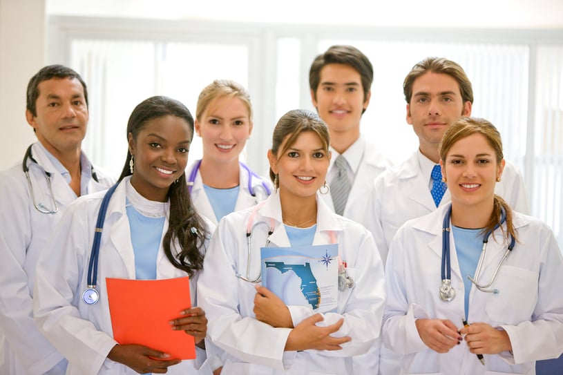 doctors in a hospital smiling and looking friendly